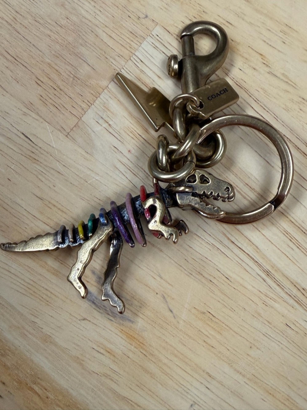 Coach colorful Dinosaur Keychain - Picture 7 of 10